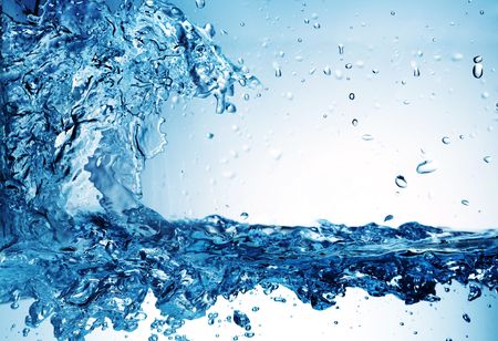 shot of water splashing colored in blueの写真素材