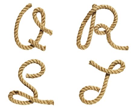 old natural fiber rope bent in the form of letter Q, R, S, Tの写真素材