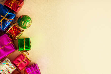 Red, Green, Gold, and Silver Wrapped Holiday Christmas Gifts on paperの写真素材