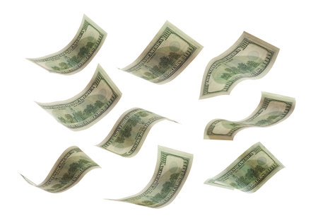 Falling dollars to stack isolated on white
