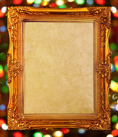 gold antique frame over abstract bokeh backgroundの写真素材