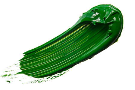 yellow paint tray isolated over whiteの写真素材