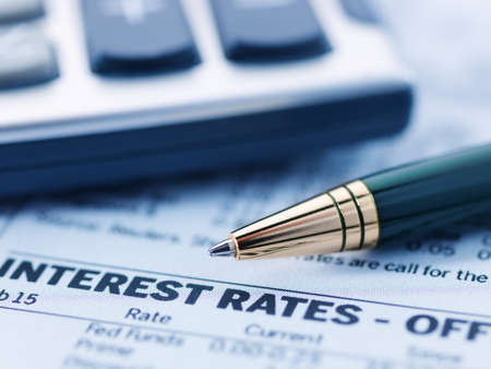 Financial concept. Calculator and pen.  shallow DOF.の写真素材