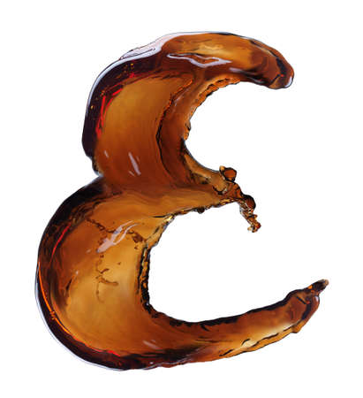 Splash of cola in the form of lettersの写真素材