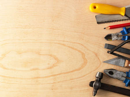 Different Tools on a wooden backgroundの写真素材