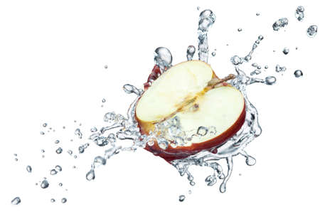 Apple in spray of water. Juicy apple with splash on white backgroundの写真素材