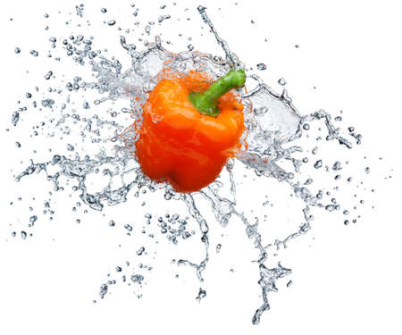 Pepper in spray of water. Juicy peach with splash on white backgroundの写真素材