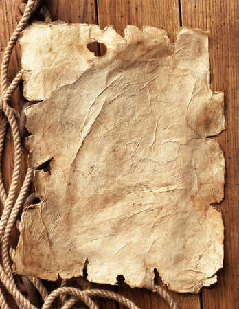 paper, rope, chain on wooden boardの写真素材