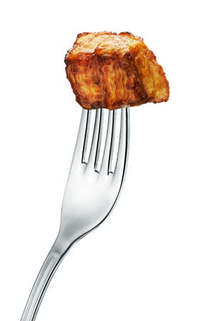 meat on a fork isolated on white backgroundの写真素材