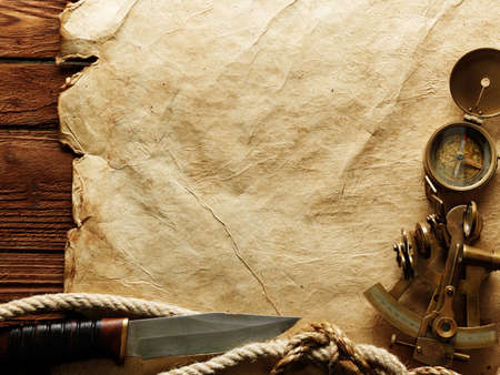 Close up view of compass on vintage paperの写真素材