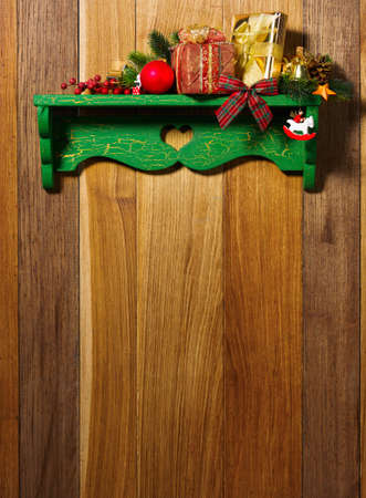Christmas decoration with presents on wood boardの写真素材