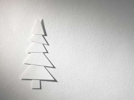 Cristmas tree paper cutting design card.の写真素材