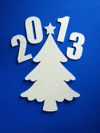 Cristmas tree paper cutting design card.