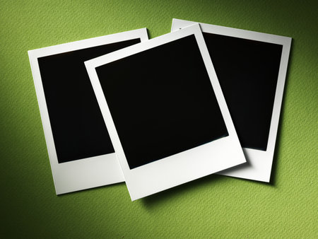 polaroid style photo frames on cardboardの写真素材