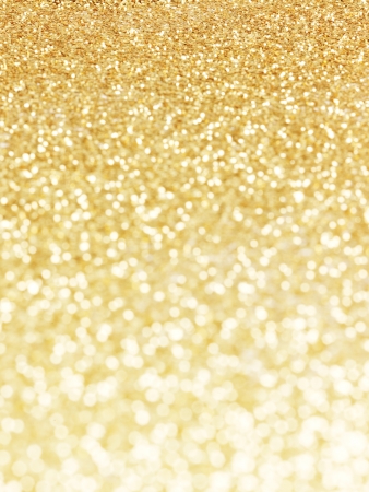golden background of defocused abstract lights. golden bokeh lights.の写真素材
