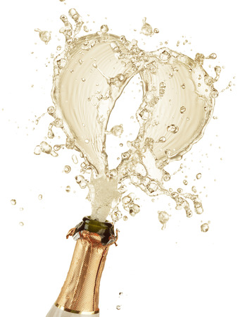 Splashing champagne heart symbol, isolated on white backgroundの写真素材