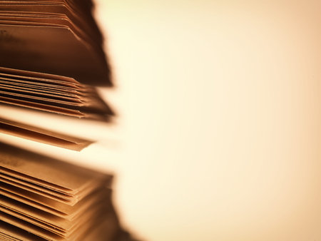 Close-up of the scattered pages of an old open book, concept of literature and knowledge, with copy...