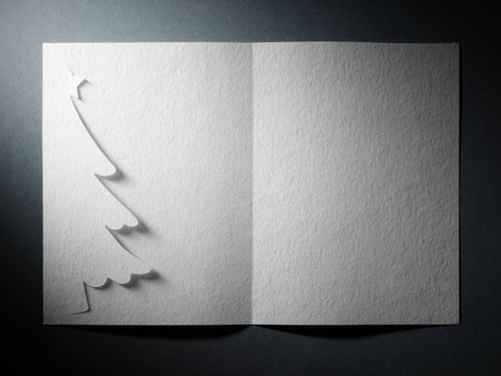 Cristmas tree paper cutting design card.の写真素材