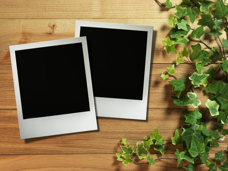 Blank style photo frames on corkboard with paper heart