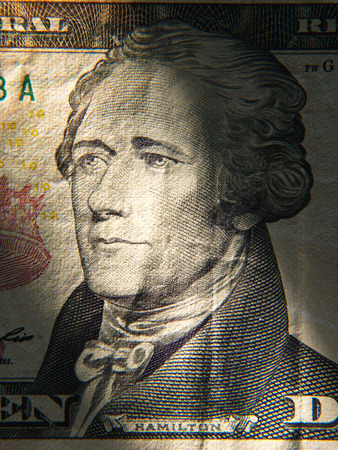 Alexander Hamiltons portrait is depicted on painted on the $ 10 banknotes. Close upの写真素材