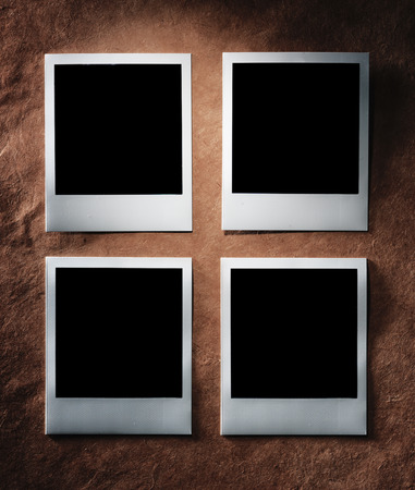 polaroid style photo frames on the very vintage paperの写真素材