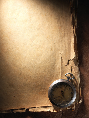 Vintage compass on the very old paperの写真素材