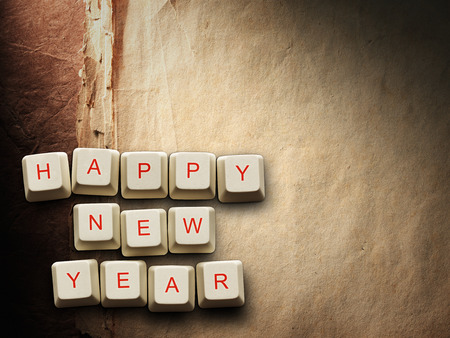 Happy New Year - Christmas tree made of computer keys, Old paper backgroundの写真素材