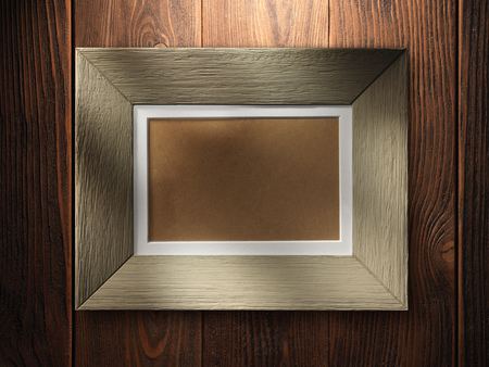 Empty wooden frame on wood backgroundの写真素材