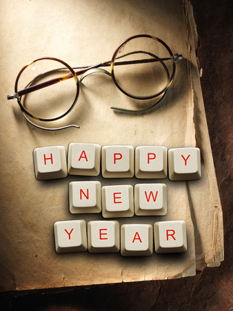 Happy New Year - made of computer keys and glasses, Old paper backgroundの写真素材