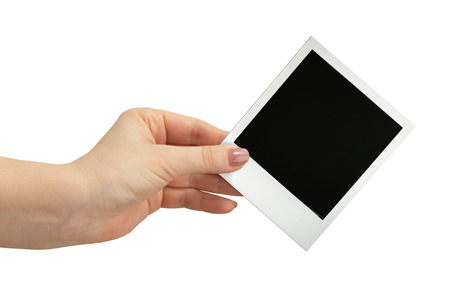 photo in hand isolated on white backgroundの写真素材