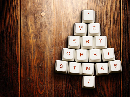 Christmas card - Christmas tree made of computer keys,tree background with vignetteの写真素材