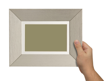 man's hand holding a wooden box isolated on white background. close upの写真素材