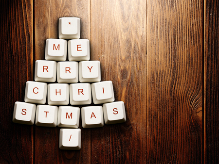 Christmas card - Christmas tree made of computer keys,tree background with vignetteの写真素材
