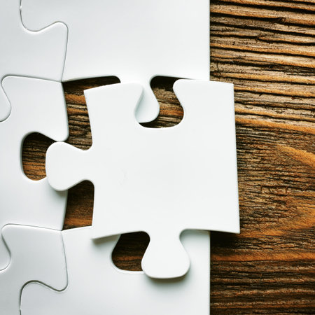 Placing missing a piece of puzzle. business concept. wooden backgroundの写真素材