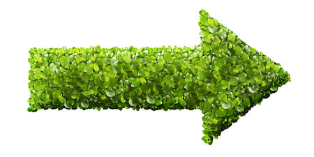 Arrow sign from the green grass. Isolated on whiteの写真素材