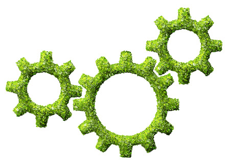 cogs or gears from the green grass. Isolated on whiteの写真素材
