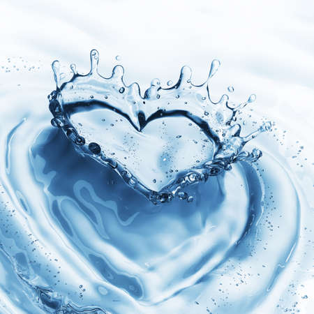 Heart from water splash with bubbles on blue water background. 3d renderingの写真素材