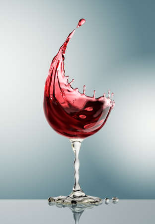 red wine glass on gray background. 3d renderingの写真素材
