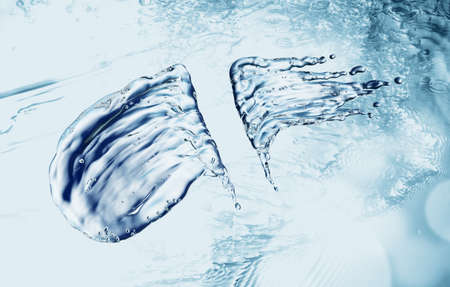 Water splash on blue bokeh background. 3d renderingの写真素材