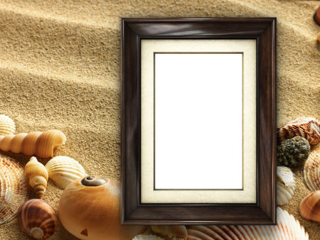Pictue frame on shells and sand background. Copy space.の写真素材