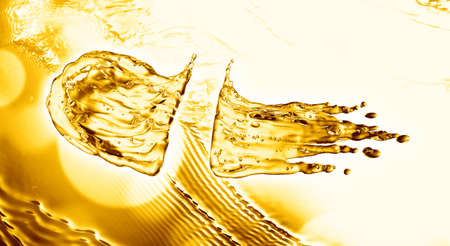 oil splash on gold bokeh background. 3d renderingの写真素材