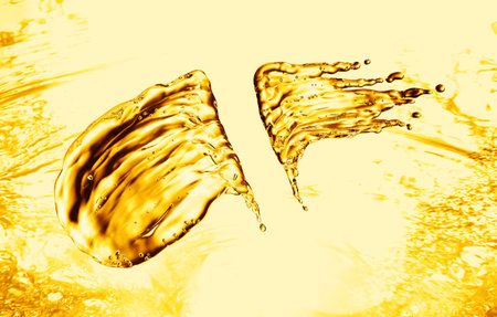 oil splash on gold bokeh background. 3d rendering