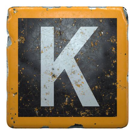 Public road sign orange and black color with a white capital letter K in the center isolated background. 3d renderingの写真素材