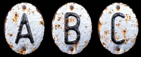 3D render set of capital letters A, B, C made of forged metal on the background fragment of a metal surface with cracked rust. 3d renderingの写真素材
