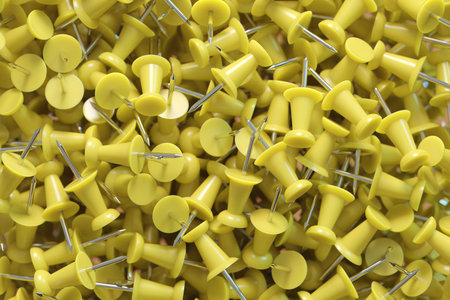 several assorted colors of plastic push pins