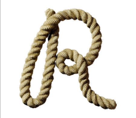old natural fiber rope bent in the form of letter Rの写真素材
