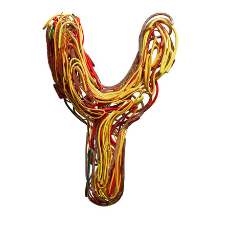 Vibrant Chaos: A Colorful Tangle of Wires Shaped Like an yの写真素材