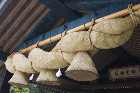 Big ropes hanging in front of shrineの写真素材