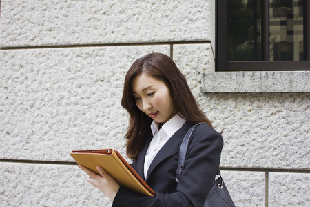 Young businesswoan using tablet computerの写真素材