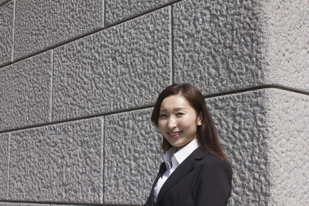 Young business woman smilingの写真素材